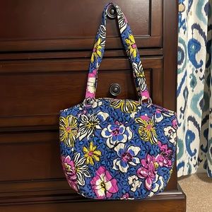 Vera Bradley multi colored purse with several pockets